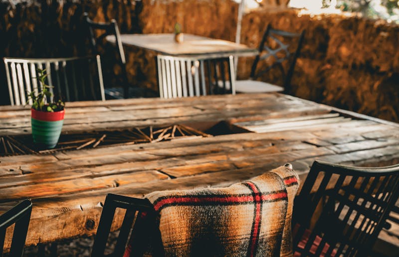 Cozy corner booth seating at Via 313 restaurant interior